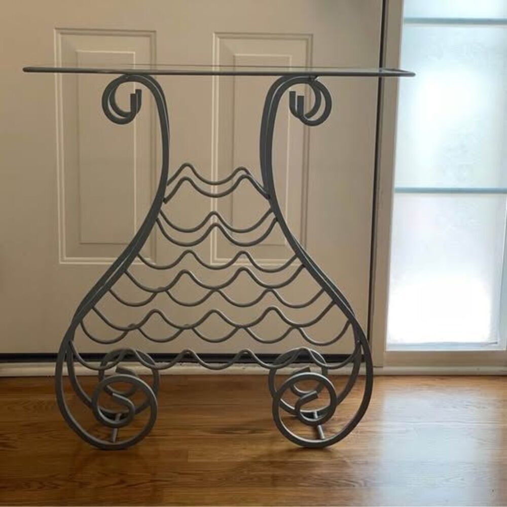 📍 For Sale – $35
Stylish Metal & Glass Top Wine Rack – Unique Scroll Design